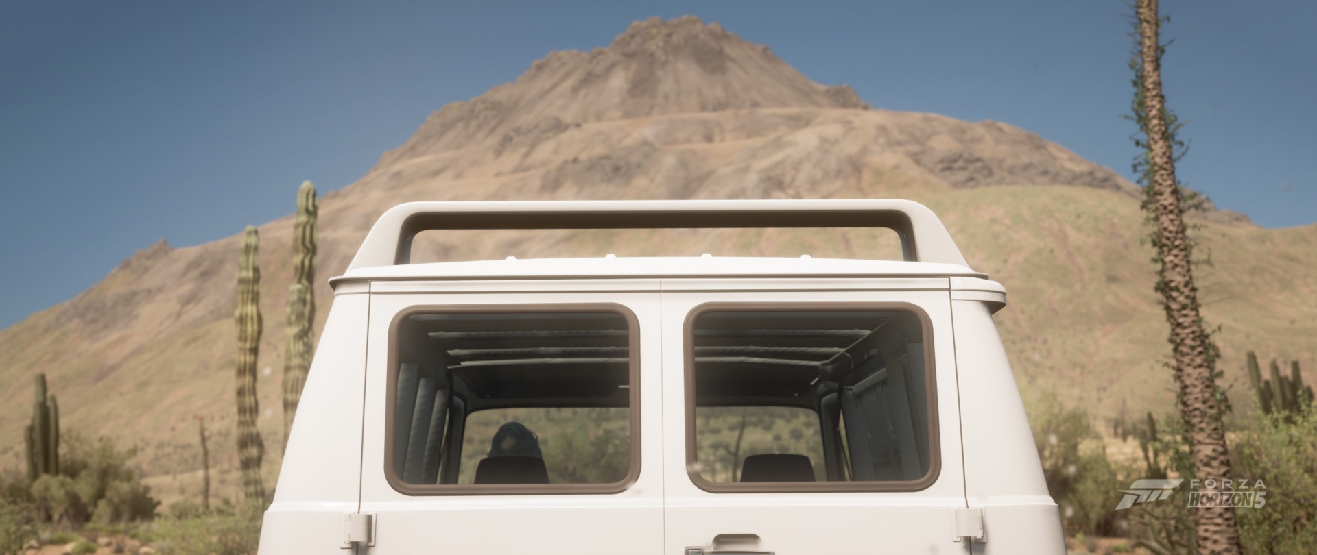 A van sits at the foot of the central volcano in "Forza Horison 5". Screenshot captured by Quint Iverson.